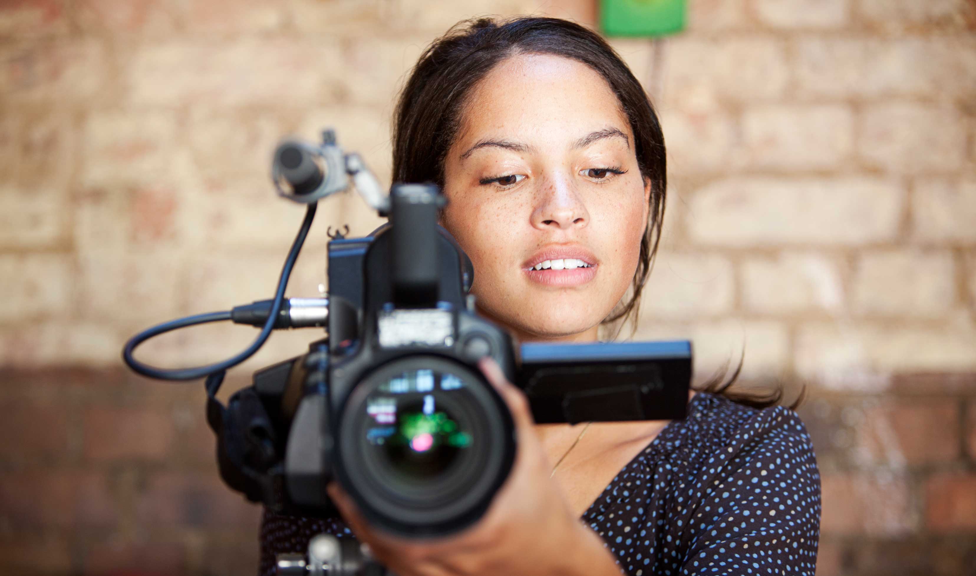 digital video woman with camera